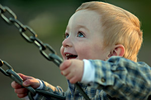 Photo of child on a swing