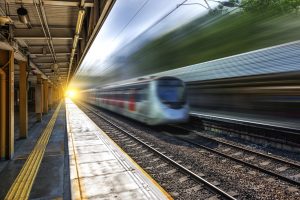 commuter train pulling into station