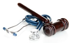 Medical malpractice law. Gavel and stethoscope.