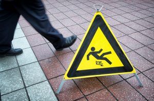 caution wet floor sign at a corridor