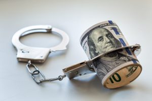 Money in handcuffs