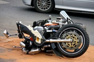 Motorbike Accident on the road with a car