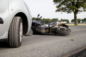 Motorbike Accident on the road with a car