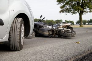 Motorbike Accident on the road with a car